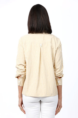 Cali Girls Checked Boyfriend Blouse in Mustard/White. Pointed collar button down check blouse. Long sleeves with bias check button cuff. Side seams wrap to front. Front slits at seams with bias check button tab. Back yoke. Relaxed fit._35035602682056