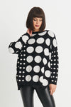 Planet Lots a Dots Sweater in Black with different size White polka dots in a geometric pattern. Crew neck oversized sweater with long sleeves. Drop shoulder. Side slits. Rib trim at neck, hem and cuff. Oversized fit._t_34273276199112