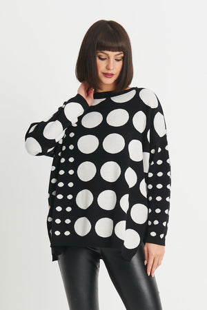 Planet Lots a Dots Sweater in Black with different size White polka dots in a geometric pattern. Crew neck oversized sweater with long sleeves. Drop shoulder. Side slits. Rib trim at neck, hem and cuff. Oversized fit._34273276199112