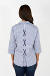 Cali Girls Gingham Lace Up in Blue/White. navy and white gingham check button down blouse. Pointed collar, 3/4 sleeve with turn back cuff. Back inverted pleat with crisscross navy ribbon lacing. Relaxed fit._t_34626627010760