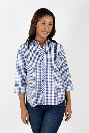 Cali Girls Gingham Lace Up in Blue/White.  navy and white gingham check button down blouse.  Pointed collar, 3/4 sleeve with turn back cuff.  Back inverted pleat with crisscross navy ribbon lacing.  Relaxed fit._34626623733960