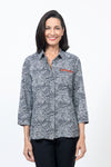 Beau Chemise Betty Grid Blouse in Cream and Black.  Interlocking grid pattern in black and cream.  Pointed collar button down swing shirt with hidden button placket.  3/4 sleeve with split back cuff.  Zipper trim above left breast in rust.  Back yoke and inverted pleat.  Relaxed fit._t_34519304863944