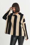 Planet Vertical Rib Sweater in Black/Sand. Wide vertical rib stripes on body and sleeves. Cowl neck with long sleeves and drop shoulder. Side slits. Oversized fit. One size fits most._t_34273289601224