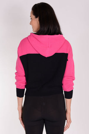 Planet Waffle Hoodie in Lipstick/Black. Two tone waffle pullover hoodie. Crew neck with attached hood and knit drawstring. Long sleeves with contrast color cuffs. Rib trim at cuff and hem. Cropped length. Oversized at shoulder and bust; cinched at hem.One size fits many._34329581813960