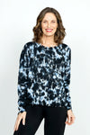 Planet Graffiti Sweater in Midnight. Light blue and white  splash prints with over printed midnight graffiti. Crew neck long sleeve sweater with notched sides. Drop shoulders. Rib trim at neck, hem and cuff. Distressed edges. One size fits many. Oversized fit._t_52933313429870