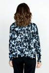 Planet Graffiti Sweater in Midnight. Light blue and white  splash prints with over printed midnight graffiti. Crew neck long sleeve sweater with notched sides. Drop shoulders. Rib trim at neck, hem and cuff. Distressed edges. One size fits many. Oversized fit._t_52933313462638