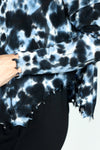 Planet Graffiti Sweater in Midnight. Light blue and white  splash prints with over printed midnight graffiti. Crew neck long sleeve sweater with notched sides. Drop shoulders. Rib trim at neck, hem and cuff. Distressed edges. One size fits many. Oversized fit._t_52933313495406