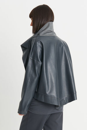 Planet Vegan Leather Asymmetrical Jacket in Obsidian, a dark gray. Open jacket with asymmetric hem and wide collar. Long sleeves._34300867739848