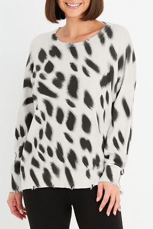 Planet Brush It Sweater in Vanilla with Black brush  strokes.  Crew neck long sleeve sweater with drop shoulders.  Distressed edges.  One size fits many.  Oversized fit._34858253222088