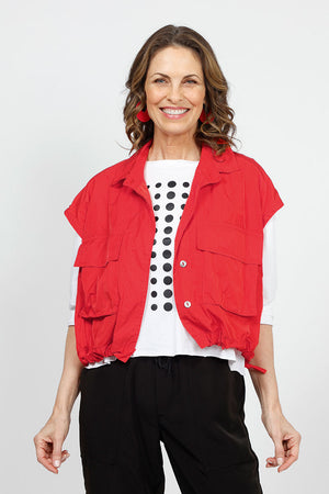 Planet Mini Cargo Vest in Cherry. Pointed collar button down cropped vest with covered button placket. 2 front lap large cargo pockets. Elastic cinching at hem. One size fits many._34924130304200