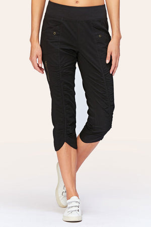 Wearables Iris Crop in Black.  2 1/2" jersey waistband with poplin body.  2 deep front pockets with grommet detail.  Center seams and contour seams.  Ruched detail front and back.  Front tulip hem.  22" inseam._61270052831598