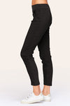Wearables Malanda Pant in Black.  Pull on pant with 2 1/2" jersey elastic waistband.  Poplin body.  2 front slash pockets.  1 single zip front pocket.  Contour seams.  Ruched detail on front leg.  Jersey insets at side.  28" inseam. _t_61269626323310
