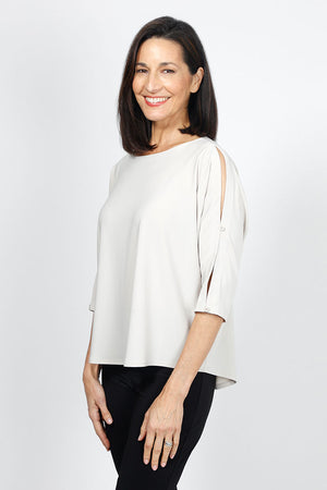 Sympli Convoy Top in Cashew. Boat neck relaxed top with elbow length slit sleeve. Functional buttons on sleeve. Slightly tapered to hem._35033450938568