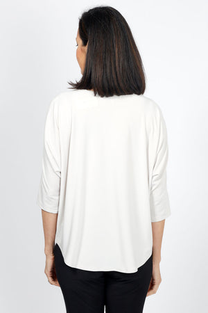 Sympli Convoy Top in Cashew. Boat neck relaxed top with elbow length slit sleeve. Functional buttons on sleeve. Slightly tapered to hem._35033450971336