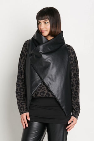 Planet Vegan Leather Padded Vest in Black.  Microfiber stand collar.  Cross over single button closure.  Pointed front hem.  One size fits many._35932251291848