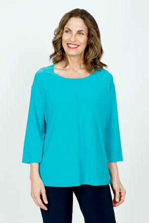 Sympli Splice Double Cuff Top in Gem, a bright jade.  Crew neck top with center seam and banded bottom.  3/4 sleeve with double cuff.  Raw edges.  Relaxed fit._59519404867950