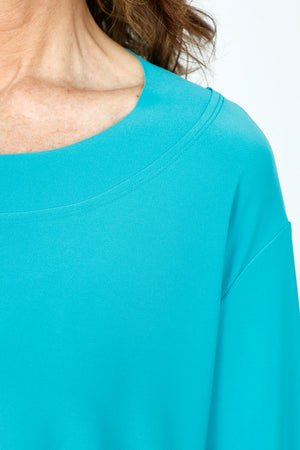 Sympli Splice Double Cuff Top in Gem, a bright jade.  Crew neck top with center seam and banded bottom.  3/4 sleeve with double cuff.  Raw edges.  Relaxed fit._59519405064558
