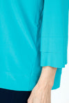 Sympli Splice Double Cuff Top in Gem, a bright jade.  Crew neck top with center seam and banded bottom.  3/4 sleeve with double cuff.  Raw edges.  Relaxed fit._t_59519404999022