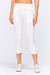 Wearables Geyser Crop in White.  Pull on pant with jersey waist.  Poplin body.  Front slash pockets.  Ruched detail down center leg.  Jersey insets on side leg.24 1/2" inseam._t_34250945462472