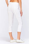 Wearables Geyser Crop in White.  Pull on pant with jersey waist.  Poplin body.  Front slash pockets.  Ruched detail down center leg.  Jersey insets on side leg.24 1/2" inseam._t_34250945396936