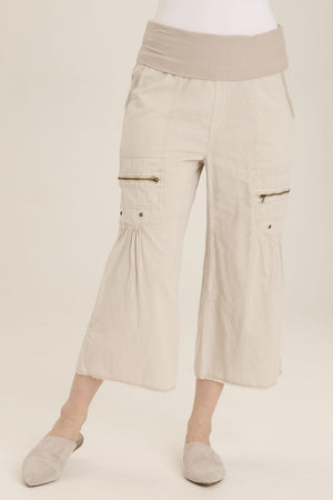 Wearables Pasqual Crop in Ripple Pigment.  Foldover jersey waistband with faux zipper placket.  2 deep front pockets.  Zipper detail and grommets below pockets.  Softly gathered at pockets.  2 rear patch pockets.  Wide leg with slightly flared hem and raw edge. 22" inseam._60009108504942