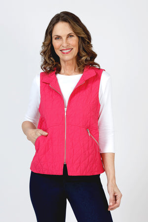 Olivia by Habitat Kaleidoscope City Vest in Raspberry.  Convertible collar quilted sleeveless vest wtih zip front. Asymmetric seaming at waist.  2 angled zip front pockets.  Fully lined. Relaxed fit._59835541389678