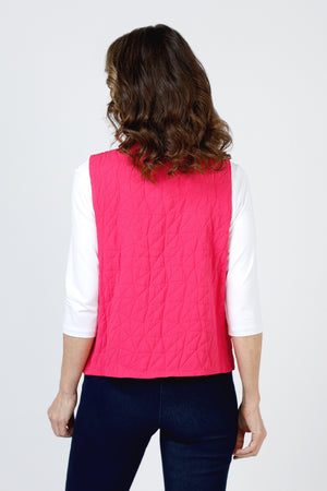 Olivia by Habitat Kaleidoscope City Vest in Raspberry.  Convertible collar quilted sleeveless vest wtih zip front. Asymmetric seaming at waist.  2 angled zip front pockets.  Fully lined. Relaxed fit._59835541356910