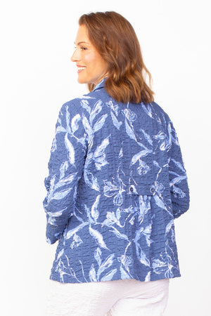 Habitat Pucker Scoop Pocket Jacket in Twilight blue with a blue and white floral print. Adjustable wire collar button down blouse/jacket with 3/4 sleeve with cuff. Front rounded patch pockets with button detail. Back tab with 2 buttons. Gently gathered below tab. Relaxed fit._35122609127624