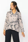 Habitat Pucker Scoop Pocket Jacket in Taupe with a black and white floral print.  Adjustable wire collar button down blouse/jacket with 3/4 sleeve with cuff.  Front rounded patch pockets with button detail.  Back tab with 2 buttons.  Gently gathered below tab.  Relaxed fit._t_35122608799944