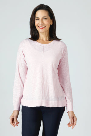 Metric Linen Front Seam Side Slit Sweater in Pale Pink.  Cotton/linen slub knit.  Crew neck with long sleeves.  Raised center seams front and back.  Rib trim at neck,hem and cuffs.  Side slits. High low hem.  Relaxed fit._59972002218350