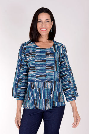 Habitat Pucker Seam Pullover in Teal.  Miniature brush stroke pattern in shades of teal, and black and off white.  Pieced construction with off center seaming front and back with horizontal inset panels.  Step hem front and back. 3/4 sleeve with step hem.  Crew neck.  Boxy fit._34378103423176