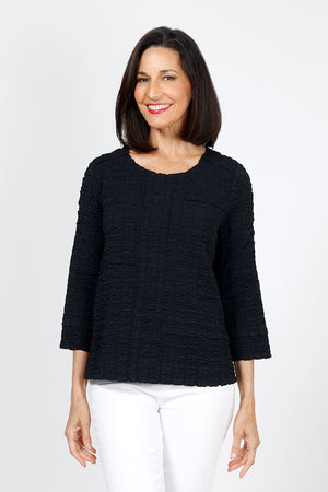 Habitat Pucker Mixed Seams Top in Black. Puckered crew neck 3/4 sleeve top with pieced front with mixed seam detail. Relaxed fit._35322672545992