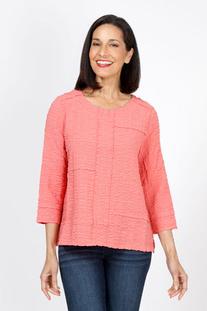 Habitat Pucker Mixed Seams Top in Melon. Puckered crew neck 3/4 sleeve top with pieced front with mixed seam detail. Relaxed fit._35322672513224