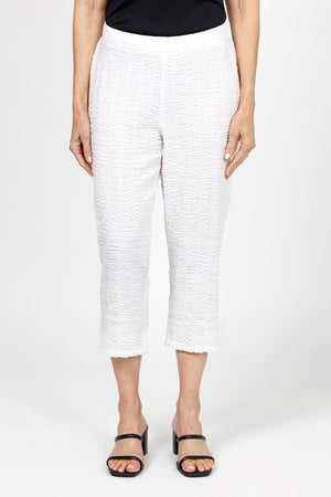 Habitat Pucker Capri in White. Pull on pant with 1 1/2" front flat waistband and elastic back. No pockets. Relaxed through hip and thigh; straight to hem. 22" inseam._35123233587400