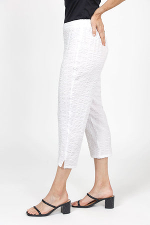 Habitat Pucker Capri in White. Pull on pant with 1 1/2" front flat waistband and elastic back. No pockets. Relaxed through hip and thigh; straight to hem. 22" inseam._35123233423560