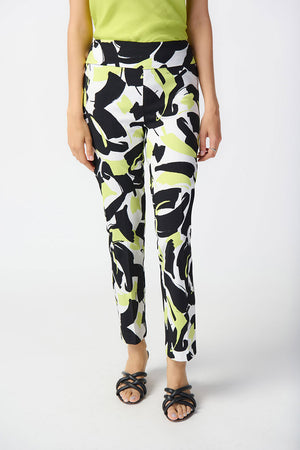 Joseph Ribkoff Abstract Print Ankle Pant.  Black and white print with pops of lime.  Pull on pant with 3" waistband.  Snug through hip and thigh, falls straight to hem.  27" inseam._34829129973960