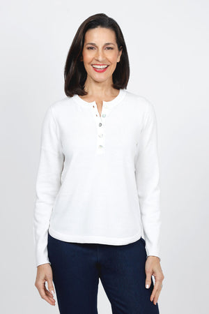 Lisa Todd Patch Magic Sweater in White.  Cotton knit crew neck with 5 button front placket.  Long sleeves.  Heart patches with hand embroidery at elbows.  Curved hem.  Classic fit._35110323454152