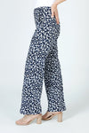 Lisette L Montreal Dot Jacquard Wide Leg Pant in Navy with white dots.  Textured jacquard pull on pant with 1 1/2" stretch waistband.  2 front slash pockets.  Snug through stomach and hip, falls straight through leg.  Wide leg. 30" inseam._t_59950026490222