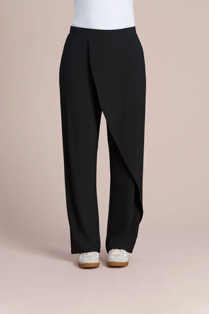 Sympli Suitable Rapt Pant in Black.  Pull on pant with set in waistband.  Draped asymmetric panel on across left front leg.  Straight leg.  Plain back.  30" inseam._61386354295150