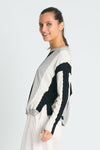 Planet Ric Rac Sweater in Black/Titanium/Stone. Slightly cropped pima cotton/modal knit with long sleeves and dropped shoulders.  Vertical striping with wavy edges.  Solid rib trim at neck and hem.  Side slits.  One size fits many.  Slightly oversized fit._t_61012428063086