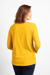 Habitat Pebble Ruched Shirt in Dijon, a mustard yellow. Crew neck 3/4 sleeve top with ruched detail down center front. Pebble cotton. Relaxed fit._t_34357618540744