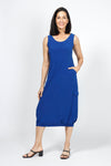 Sympli Nu Pleat Hem Tank Dress in Twilight Blue, a medium bright blue.. Scoop neck sleeveless dress. Defined waist with gathered bubble skirt with small pleats at hem. 2 front slash in seam pockets. Contour seaming. Single cargo pocket with flap on side. Relaxed fit._t_35033435406536
