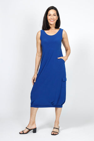 Sympli Nu Pleat Hem Tank Dress in Twilight Blue, a medium bright blue.. Scoop neck sleeveless dress. Defined waist with gathered bubble skirt with small pleats at hem. 2 front slash in seam pockets. Contour seaming. Single cargo pocket with flap on side. Relaxed fit._35033435406536