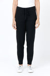 Lolo Luxe Solid Cuffed Jogger in Black. Knit pant with elastic waist and drawstring. Cuffed bottom. Inseam: 29"_t_52964601495918
