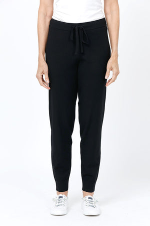 Lolo Luxe Solid Cuffed Jogger in Black. Knit pant with elastic waist and drawstring. Cuffed bottom. Inseam: 29"_52964601495918