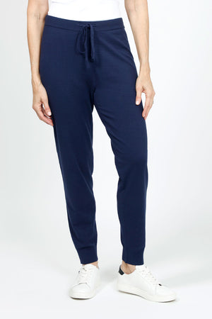 Lolo Luxe Solid Cuffed Jogger in Navy. Knit pant with elastic waist and drawstring. Cuffed bottom. Inseam: 29"_35020400754888