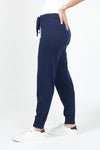 Lolo Luxe Solid Cuffed Jogger in Navy. Knit pant with elastic waist and drawstring. Cuffed bottom. Inseam: 29"_t_35020400787656