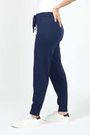 Lolo Luxe Solid Cuffed Jogger in Navy. Knit pant with elastic waist and drawstring. Cuffed bottom. Inseam: 29"_35020400787656