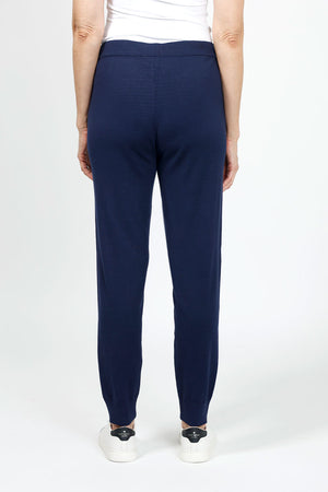 Lolo Luxe Solid Cuffed Jogger in Navy. Knit pant with elastic waist and drawstring. Cuffed bottom. Inseam: 29"_35020400722120