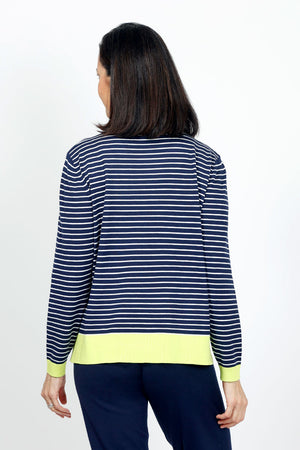 Lolo Luxe Stripe Crew Sweater in Navy with White stripes. Crew neck long sleeve sweater with lime rib trim at neck, hem and cuff. Side slits. Relaxed fit._35014033998024